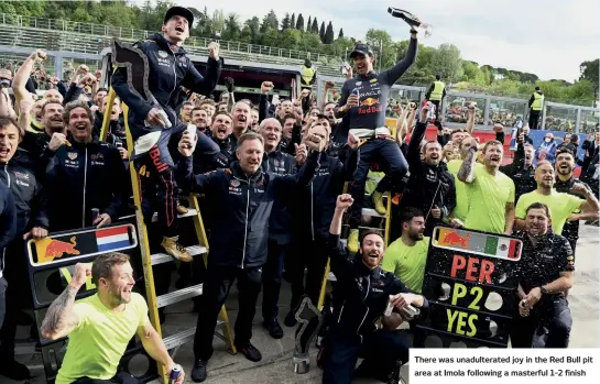  ?? ?? There was unadultera­ted joy in the Red Bull pit area at Imola following a masterful 1-2 finish