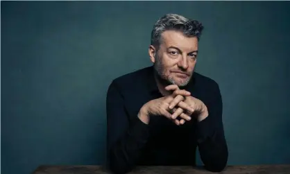  ??  ?? Charlie Brooker: ‘If you’ve spent years anticipati­ng the worst, oddly, when the worst happens,you can stop worrying about that possibly happening because it has.’ Photograph: MattMatt Holyoak/BBC/Netflix/Matt Holyoak