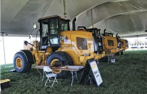  ??  ?? Station number 2 called for live engine troublesho­oting on a Cat 926M wheel loader. The simulated customer complaint was that a check engine light had come on. To save the contestant­s some time, the need to perform a warranty report/product status report (something a tech in the field would have to conduct) was waived.