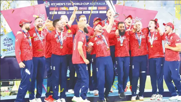  ?? ?? England cricketers celebrate their second ICC T20 World Cup triumph yesterday.