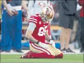  ?? NHAT V. MEYER — BAY AREA NEWS GROUP ?? San Francisco 49ers’ George Kittle kneels on the field after turning the ball over to the Arizona Cardinals in the first quarter on Sunday.