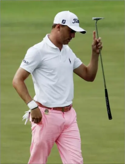  ?? THE ASSOCIATED PRESS ?? Justin Thomas reacts after his birdie on the 17th hole during the third round of the U.S. Open.
