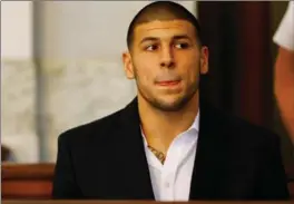  ?? JARED WICKERHAM, GETTY IMAGES ?? Aaron Hernandez had a biblical reference written on his forehead when he was found dead in his prison cell.