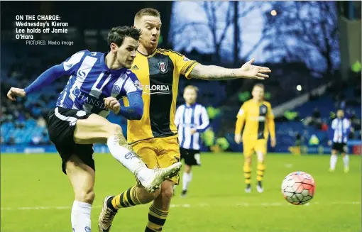  ?? PICTURES: Media Image ?? ON THE CHARGE: Wednesday’s Kieran Lee holds off Jamie O’Hara