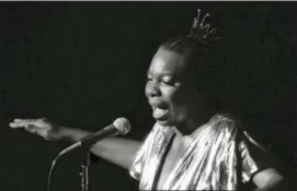  ?? RENE PEREZ — THE ASSOCIATED PRESS FILE ?? In this file photo, Nina Simone performs at Avery Fisher Hall in New York. Simone will be inducted into the Rock and Roll Hall of Fame on in Cleveland, Ohio.