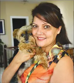  ?? Special to the Herald ?? Jaswinder Garib, seen here with her dog Gracie, is donating $30,000 as part of the overall $500,000 pledge from the South Okanagan’s Indo-Canadian community to help acquire medical equipment for the Penticton Regional Hospital expansion.