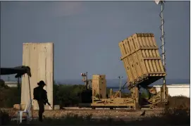  ?? ARIEL SCHALIT — THE ASSOCIATED PRESS FILE ?? A battery of Israel’s Iron Dome defense missile system, deployed to intercept rockets, sits in Ashkelon, southern Israel, Aug. 7, 2022. Israel is vowing to retaliate against Iran, risking further expanding the shadow war between the two foes into a direct conflict after an Iranian attack over the weekend sent hundreds of drones and missiles toward Israel.