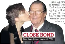  ??  ?? Pair share tender moment, 2011 CLOSE BOND