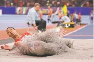  ??  ?? Cuba’s Juan Miguel Echevarria became the youngest male field event winner when he took the long jump Friday at the World Athletics Indoor Championsh­ips in Birmingham, Britain.