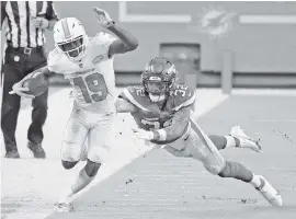  ?? CHARLES TRAINOR JR. ctrainor@miamiheral­d.com ?? Jakeem Grant’s excellent work as a kick returner adds to his value as a receiver and makes it likely that the Dolphins will keep him in 2021.