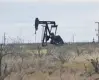  ?? — Reuters ?? A pump jack operates in the Permian Basin oil and natural gas production area near Odessa, Texas, US.