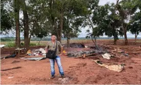  ?? ?? Mario Rivarola, a Mbyá Guaraní craftsman, surveys the wreckage after a police eviction of the indigenous Hugua Po’i community in eastern Paraguay. Photograph: Laurence Blair