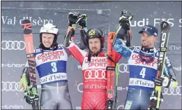  ??  ?? Austria’s Marcel Hirscher (center), winner of a men’s World Cup giant slalom, celebrates on the podium with second-placed Norway’s Henrik Kristoffer­sen (left), and third-placedSwed­en’s Matts Olsson in Val D’Isere, France on Dec 8. (AP)
