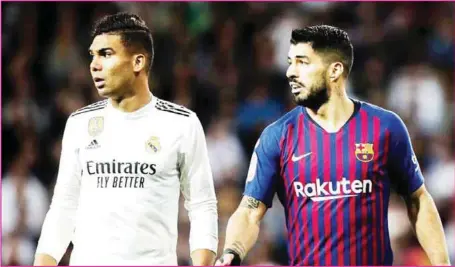 ??  ?? The duo of Casemiro and Suarez unsure of the venue of next weekend’s El clasico