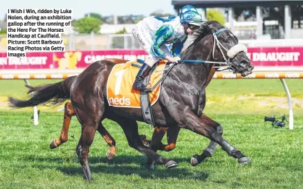  ?? ?? I Wish I Win, ridden by Luke Nolen, during an exhibition gallop after the running of the Here For The Horses Handicap at Caulfield. Picture: Scott Barbour/ Racing Photos via Getty Images