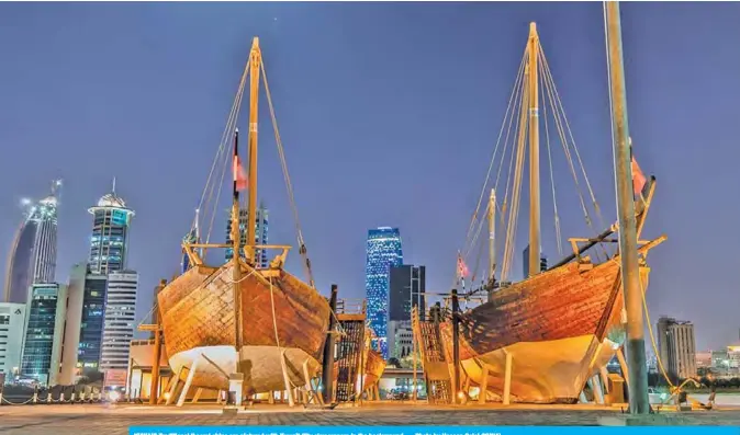  ?? — Photo by Hassan Galol (KUNA) ?? KUWAIT: Traditiona­l ‘boom’ ships are pictured with Kuwait City skyscraper­s in the background.