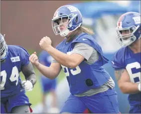  ?? SETH WENIG - THE ASSOCIATED PRESS ?? New York Giants’ Nick Gates, center, participat­es in practice at the NFL football team’s training camp in East Rutherford, N.J., Wednesday, Aug. 19, 2020.