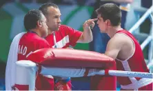  ?? THE CANADIAN PRESS/FILES ?? Daniel Trepanier, centre, has resigned from his position with Boxing Canada after his leadership was criticized.