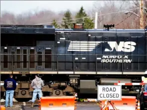  ?? Post-Gazette ?? A Norfolk Southern train passes through East Palestine, Ohio, on Feb. 9