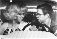  ?? UNIVERSAL PICTURES VIA THE NEW YORK TIMES ?? Candy Clark with Charles Martin Smith in “American Graffiti.”