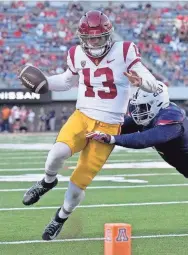  ?? RICK SCUTERI/AP ?? Southern Cal quarterbac­k Caleb Williams, shown against Arizona, has four TD runs to go with 28 TD passes.