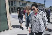  ?? Gina Ferazzi Los Angeles Times ?? REP. KAREN BASS, left, and U.S. Housing Secretary Marcia Fudge visit homeless facilities in L.A.