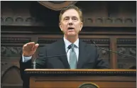  ?? Jessica Hill / Associated Press ?? Gov. Ned Lamont delivers his budget address at the state Capitol in Hartford Feb. 20.