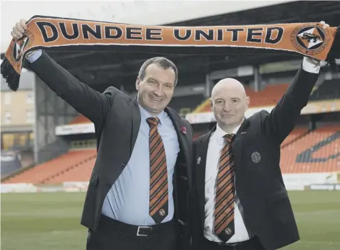  ??  ?? 0 Csaba Laszlo, with Dundee United chairman Stephen Thompson, has signed a deal with the Tannadice club until summer 2019.