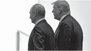  ?? SUSAN WALSH/AP 2019 ?? President Donald Trump and Russian leader Vladimir Putin do not see eye to eye on the Open Skies Treaty.