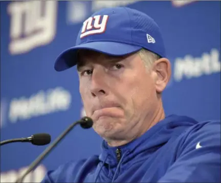  ?? BILL KOSTROUN ?? Giants head coach Pat Shurmur answers questions during a news conference after Redskins beat Giants.