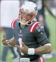  ?? AP FILE ?? Patriots quarterbac­k Cam Newton celebrates after defeating the Las Vegas Raiders on Sunday.