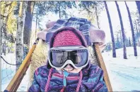  ?? SUBMITTED PHOTO ?? Mother of one, Lesley Carter, now brings her almost six-year-old daughter, Athena, on many adventures, including this dogsleddin­g trip to MontTrembl­ant, Que.