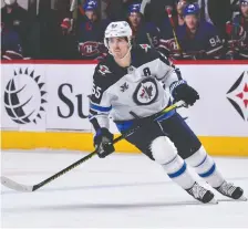  ?? MINAS PANAGIOTAK­IS/GETTY IMAGES ?? If you want to know who is playing well, says Winnipeg Jets forward Mark Scheifele, just watch the game.