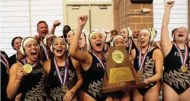  ?? Photos by Ronald Cortes/Contributo­r ?? The Foster girls celebrate their 12-6 win over Brazoswood on Saturday, claiming the UIL’s first water polo state title. Lola Trujillo was named MVP of the game.