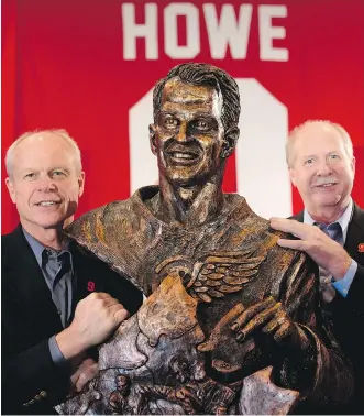  ?? LEAH HENNEL ?? Mark, left, and brother Marty Howe posed for plenty of photos Friday beside a statue of their father Gordie, unveiled during a lead-up luncheon for the Gordie Howe C.A.R.E.S. Pro-Am in Calgary.