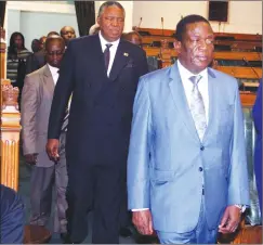  ??  ?? RIGHT: Vice Presidents Emmerson Mnangagwa and Phelekezel­a Mphoko arrive for the official opening of the Fifth Session of the Eighth Parliament in Harare yesterday.
