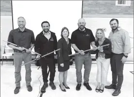  ?? Photo by Andy McKowan ?? Keeping with tradition, the speakers were presented with a wood product gift—Cherry Biltmore Sticks from Kane Hardwoods, a Collins Pine company. From left to right; Jonathan Geyer, Executive Director of the PA Hardwoods Developmen­t Council (PAHDC); Luca Pandolfi, Founder of Woodland Biomass Innovation­s, Cecile Stelter, Chair of the Roach-Bauer Forestry Forum Steering Committee; and from the Woodside Oils team Royce Novosel-Johnson, Procuremen­t Specialist; Lindsey Novosel, Operations Manager; and AJ McGarity, dōTERRA Strategic Sourcing Manager and General Manager for Woodside Oils.