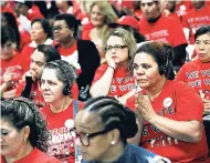  ?? AP ?? In this October 17 photo, members of the Culinary Union listen to Democratic candidates during an event at the union hall in Las Vegas. Latinos have a spotty track record in midterm elections. The Democrats need heavy Latino support to win several Senate races and take back control of the House.