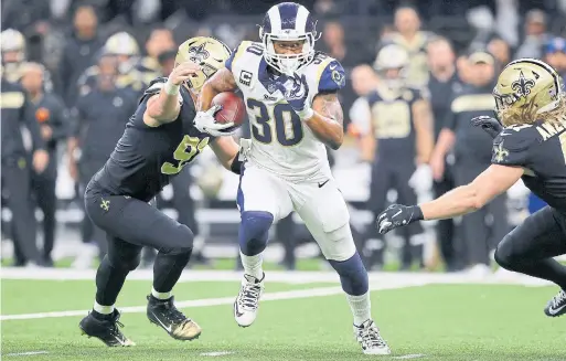  ?? KEVIN C. COX GETTY IMAGES ?? The Rams’ biggest threat is running back Todd Gurley, who was the centrepiec­e of the L.A. offence all season but who’s struggled since returning from a knee injury.