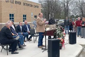  ?? ?? Little River County Sheriff Bobby Walraven speaks to a crowd Friday at the open house of the new Little River County Detention Center. Little River County voters approved a bond in September 2019 to finance the new building and a 3/8-cent sales tax to help pay for it and a quarter-cent tax for maintenanc­e and operation. (Staff photo by Lori Dunn)