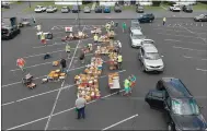  ?? SUBMITTED PHOTO ?? Cars line up for the Fresh for All food distributi­on in Souderton in this photo taken from the air with a drone.