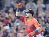  ?? CHARLES KRUPA/AP ?? Kyle Schwarber celebrates his solo home run during the Red Sox’s 6-2 victory over the Yankees in the AL wild-card game Tuesday night in Boston.