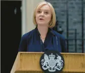  ?? KIRSTY WIGGLESWOR­TH/AP ?? New British Prime Minister Liz Truss speaks Tuesday at 10 Downing Street in London after she was formally appointed in Scotland by Queen Elizabeth II.