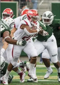  ?? NWA Democrat-Gazette/BEN GOFF ?? Arkansas running back Devwah Whaley suffered an injury in the Razorbacks’ 34-3 loss at Auburn and is being evaluated on a day-to-day basis for Saturday’s game against Texas A&amp;M.