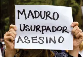  ??  ?? RECHAZO. Otro aspecto de la protesta contra Nicolás Maduro.(AFP)