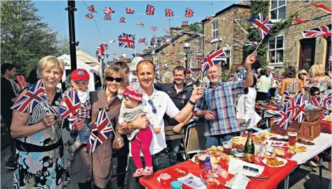  ??  ?? Fun time: why not get the flags out and enjoy Harry and Meghan’s big day, complete with suitably wedding-themed nibbles, below