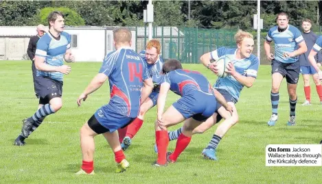  ??  ?? On form Jackson Wallace breaks through the Kirkcaldy defence