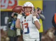  ?? HOWARD SIMMONS - THE ASSOCIATED PRESS ?? FILE - In this Nov. 17, 2018, file photo, Syracuse quarterbac­k Tommy DeVito (13) throws a pass during an NCAA college football game against Notre Dame, at Yankee Stadium in New York.