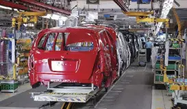  ?? ?? The assembly plant of Toyota Motor Philippine­s Corp. in Laguna ramps up production as industry sees record auto sales this year.