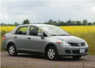  ?? TORONTO STAR FILE PHOTO ?? The 2009 Nissan Versa could seat five grown-ups comfortabl­y — or 19 frat boys painfully.